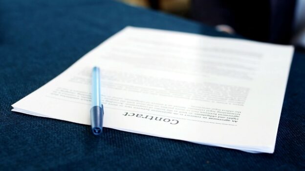 A close up of a contract