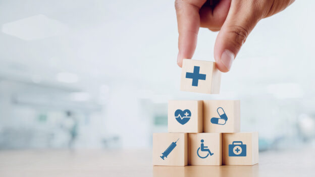 A series of building blocks with various examples of supplemental benefits being stacked in a pyramid.